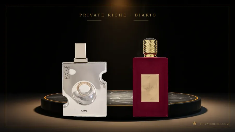 Perfume Ajmal Evoke Gold Edition y perfume Ameerat Al Arab de Asdaaf sobre un podio de ónice negro bajo un foco dorado, con humo de bakhoor de fondo