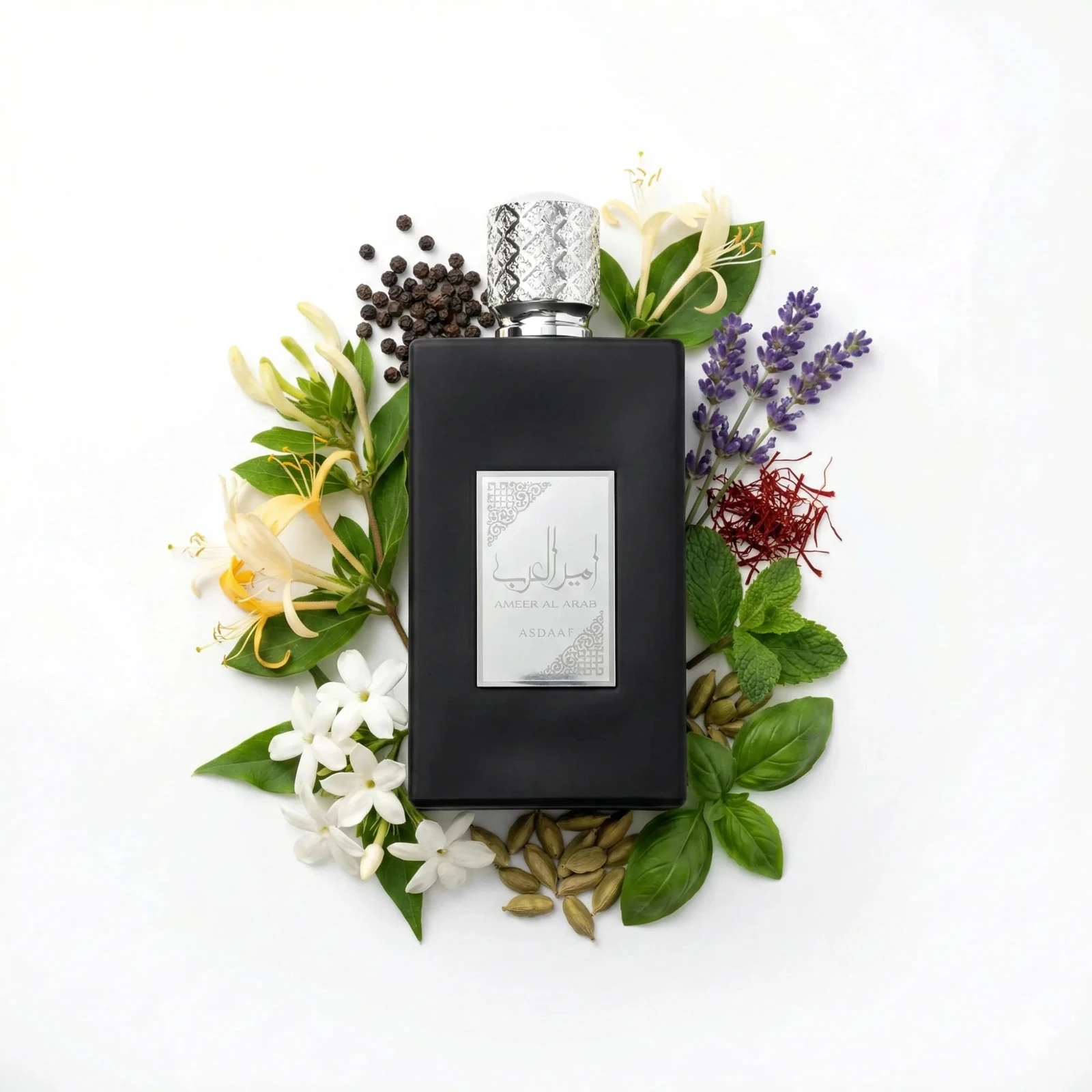Asdaaf Ameer Al Arab (Príncipe de Arabia) · 100 ml · Unisex — el frasco en un bodegón de ingredientes