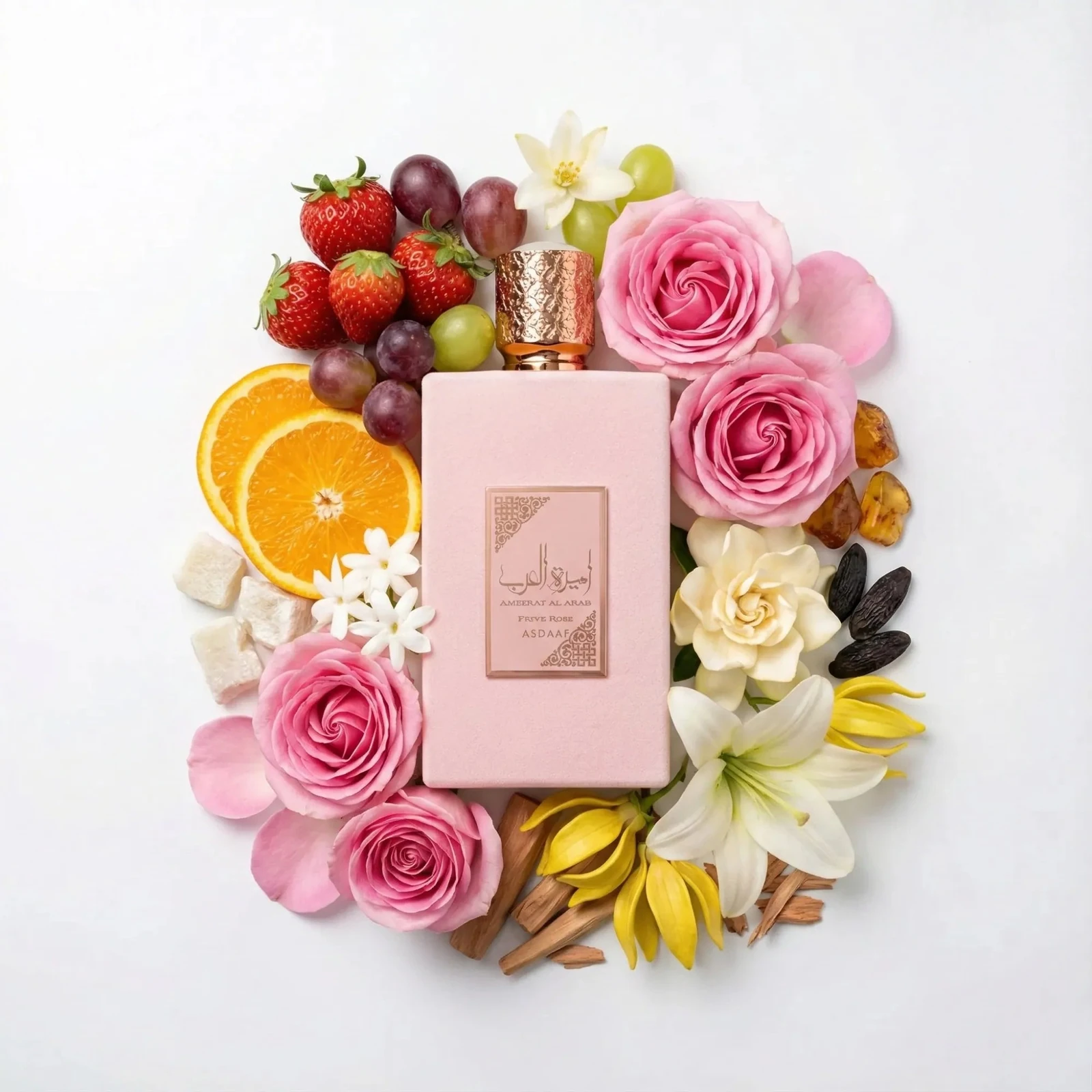Asdaaf Ameerat Al Arab Prive Rose (Princesa de Arabia) · 100 ml · para Mujer — el frasco en un bodegón de ingredientes