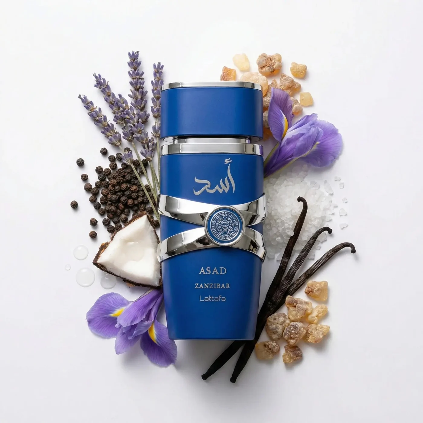 Lattafa Asad Zanzibar · 100 ml · para Hombre — el frasco en un bodegón de ingredientes