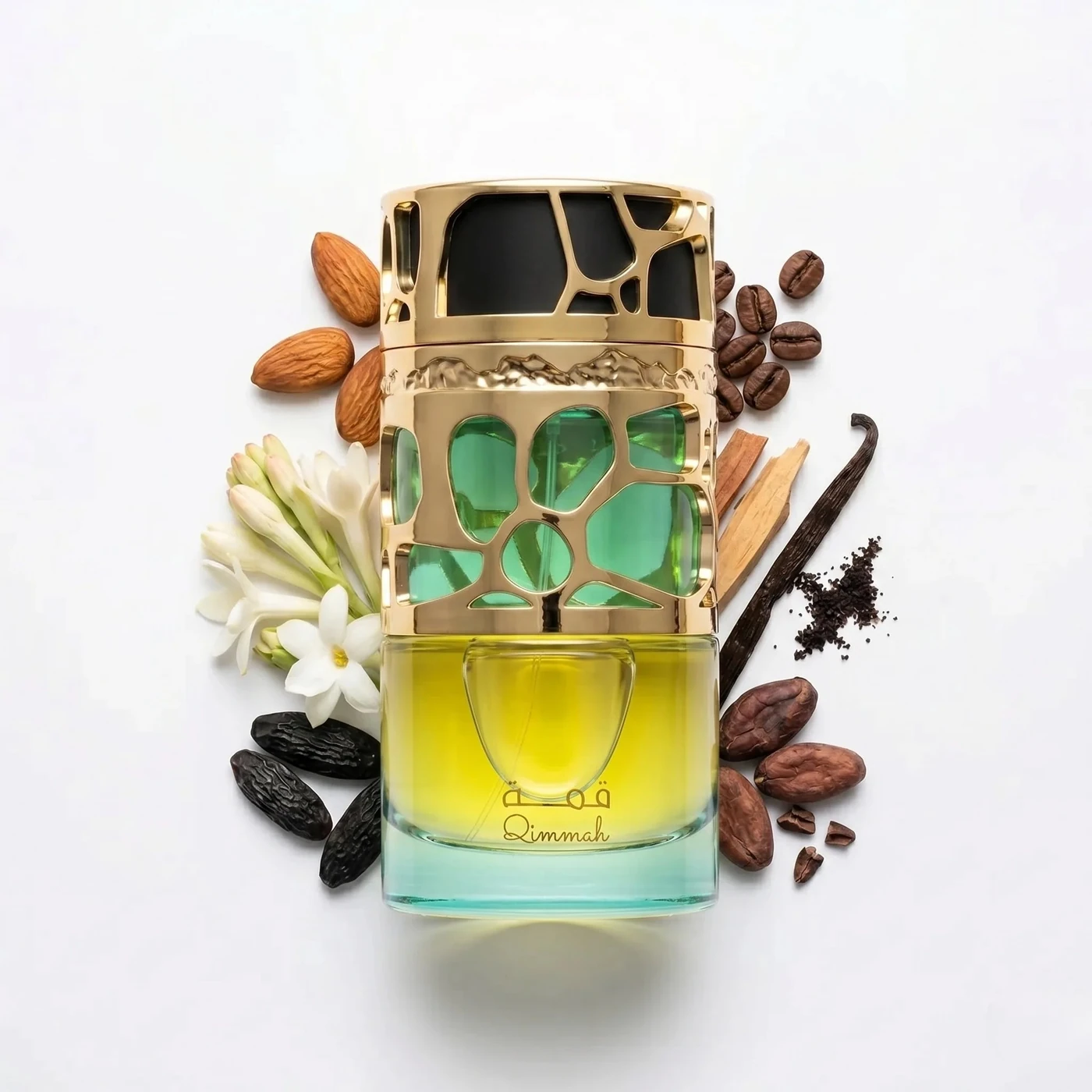 Lattafa Qimmah for Women · 100 ml · para Mujer — el frasco en un bodegón de ingredientes