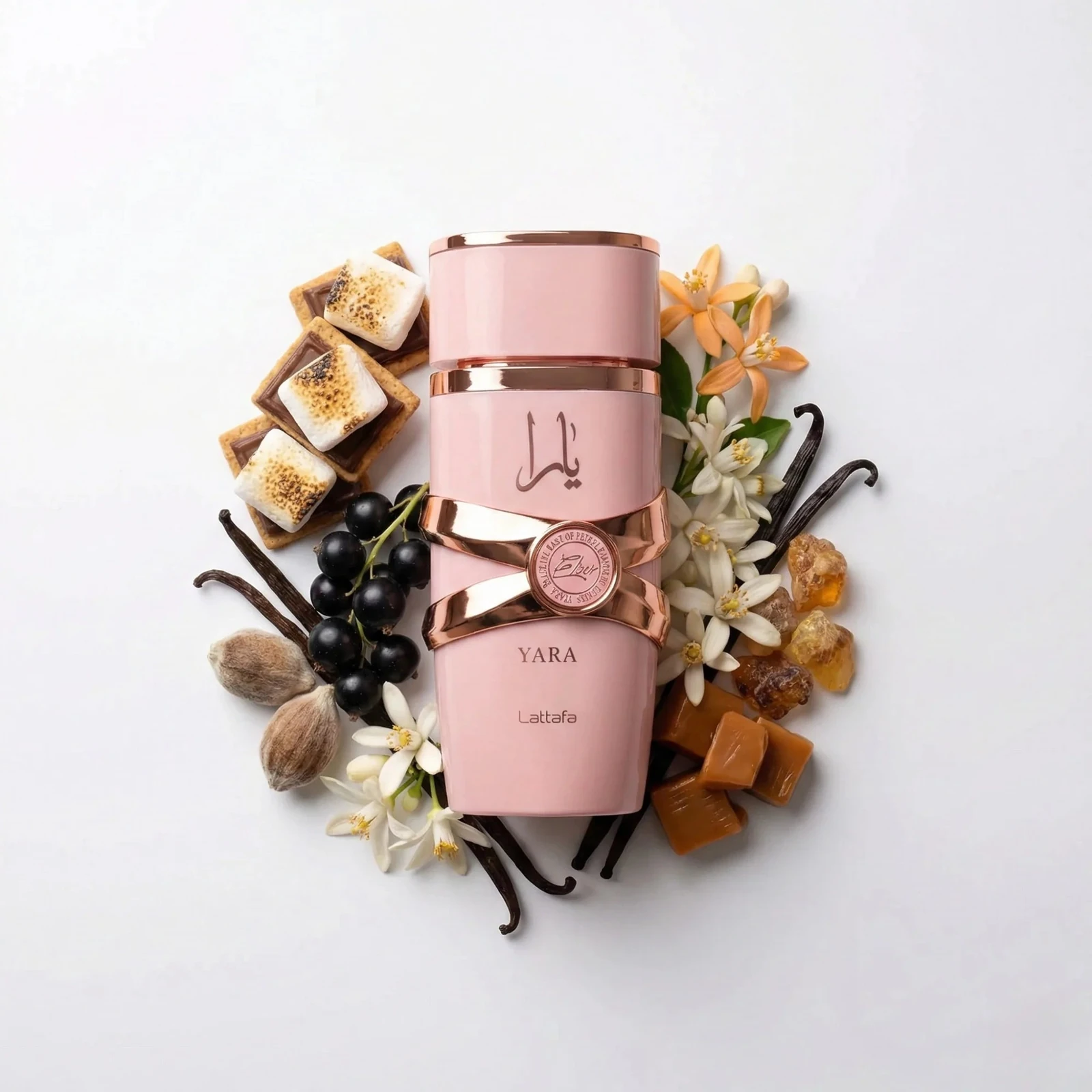 Lattafa Yara Elixir · Eau de Parfum 100 ml · para Mujer — el frasco en un bodegón de ingredientes