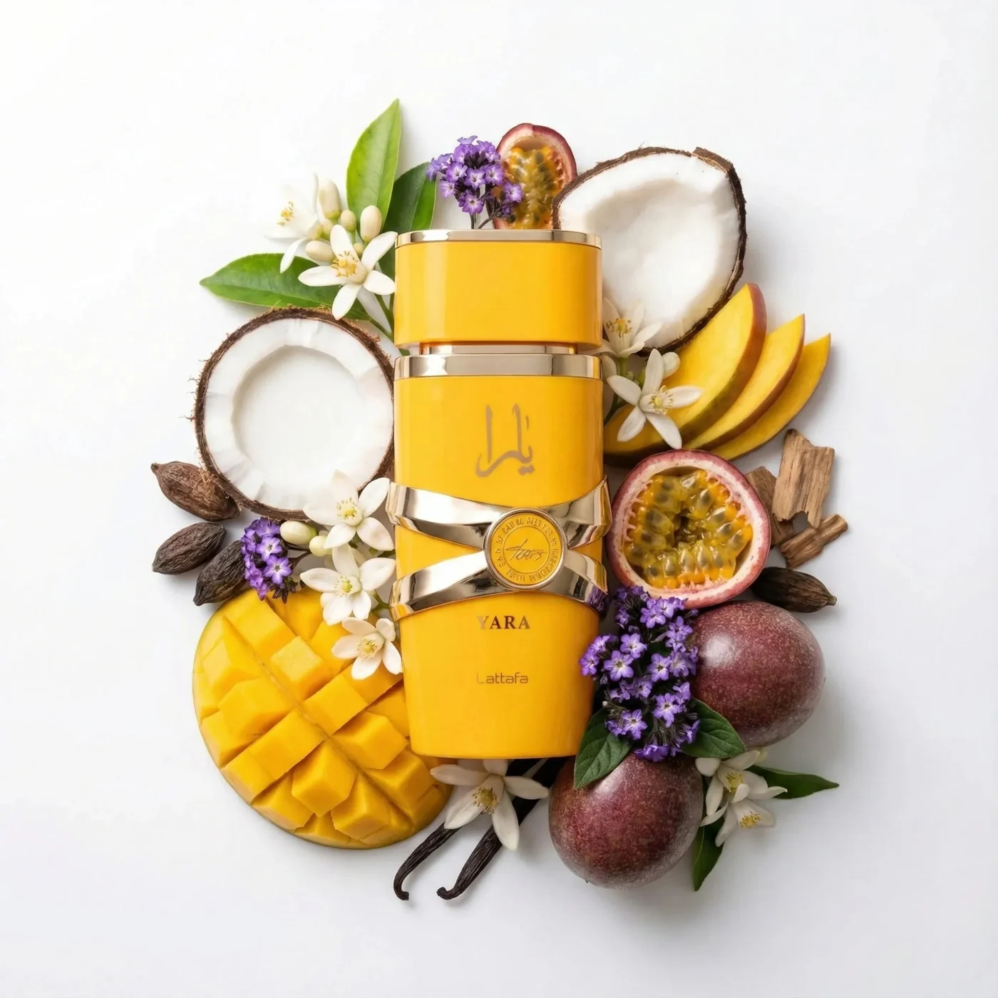 Lattafa Yara Tous · 100 ml · para Mujer — el frasco en un bodegón de ingredientes